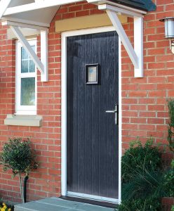 Black contemporary composite front door installation