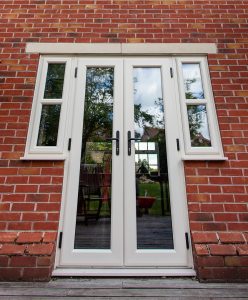 Cream uPVC french doors with black handles