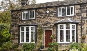 White uPVC heritage casement windows installation