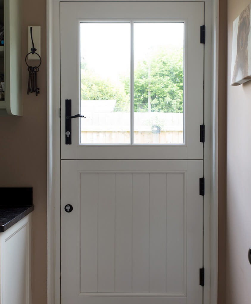 Interior view of a white timber stable door