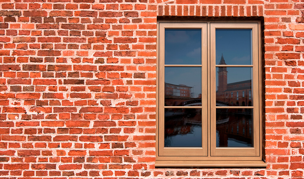 Oak effect uPVC flush sash window installation