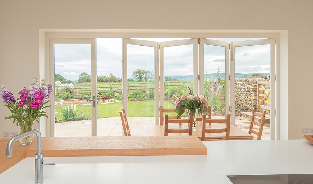 Interior view of an open timber bifold door