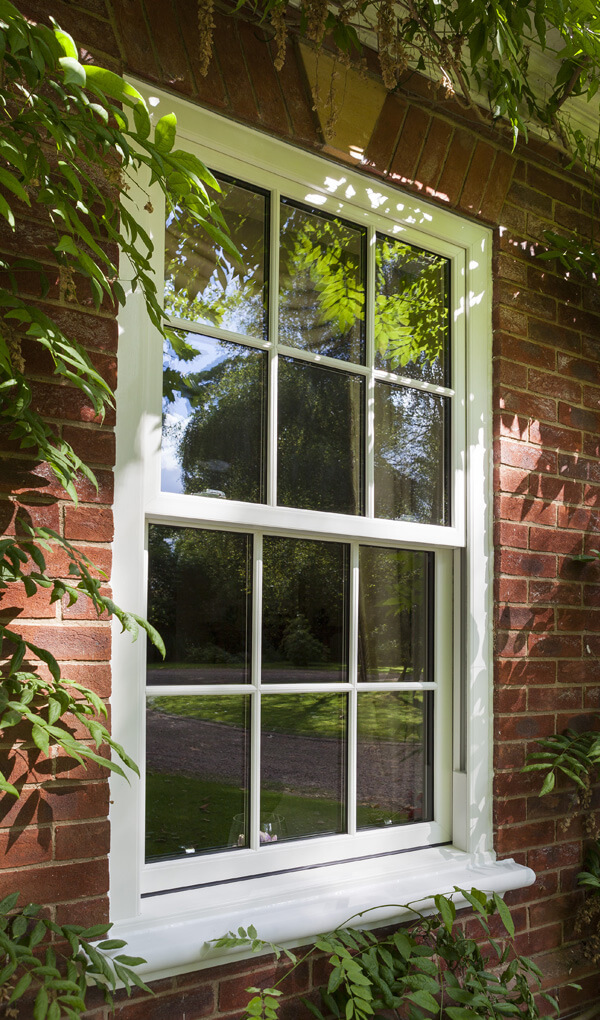 Large white uPVC vertical sliding window