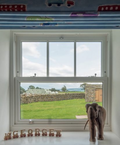 White timber vertical sliding window