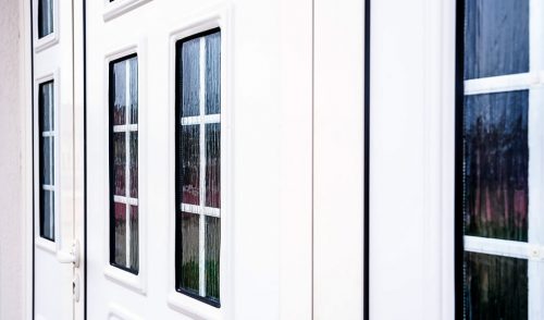 White uPVC entrance door close up