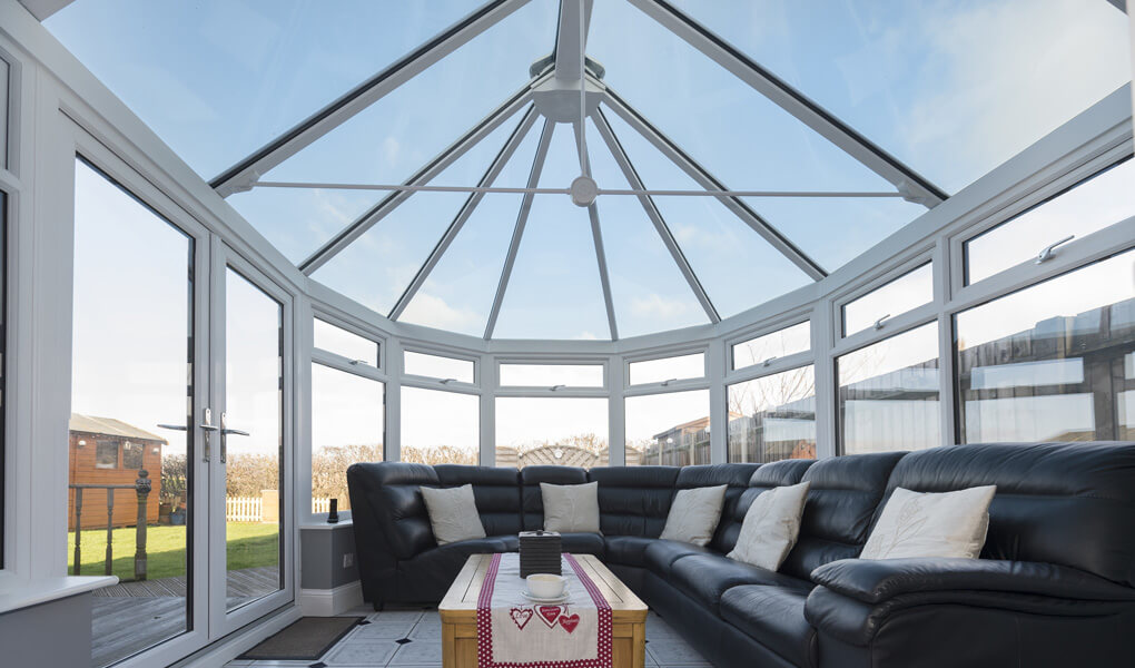 Interior view of a white uPVC Victorian conservatory