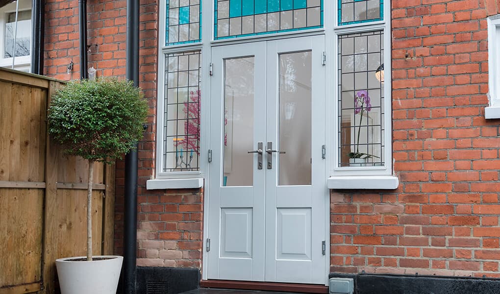 White timber French door installation