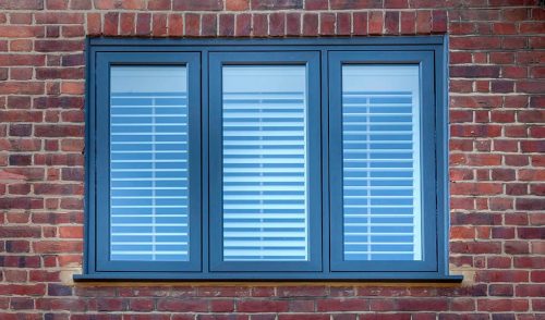 Black uPVC flush sash window installation