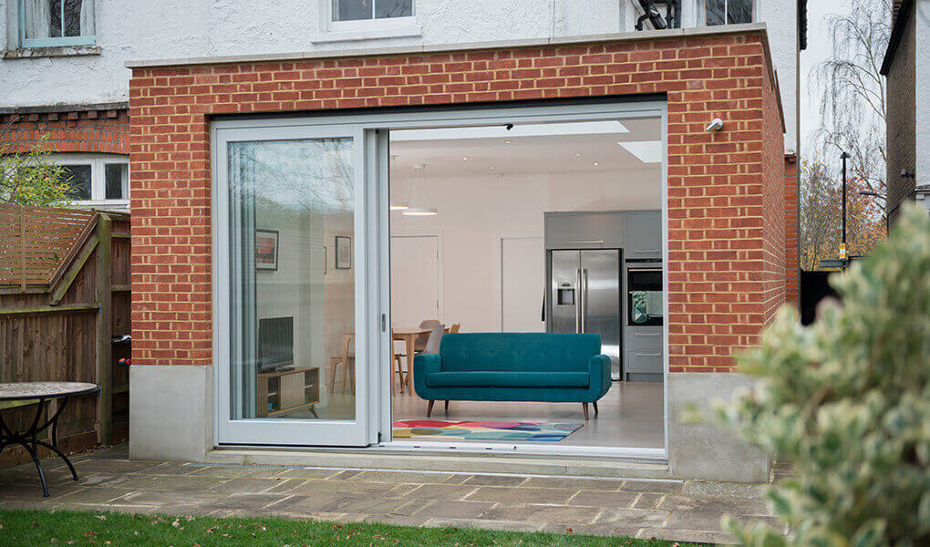 A Grey timber patio door installation.