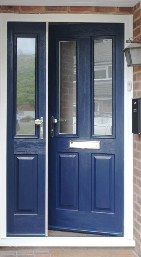 A navy blue composite front door.