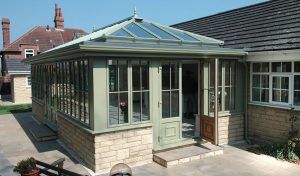 A green glass roof conservatory.