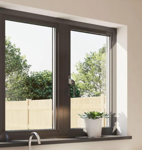 An image taken inside of aluminium tilt and turn windows. They are closed.